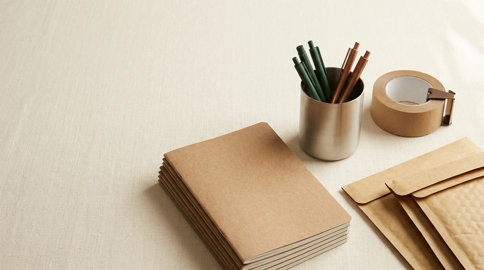 Deskwell supplies on a cream desk